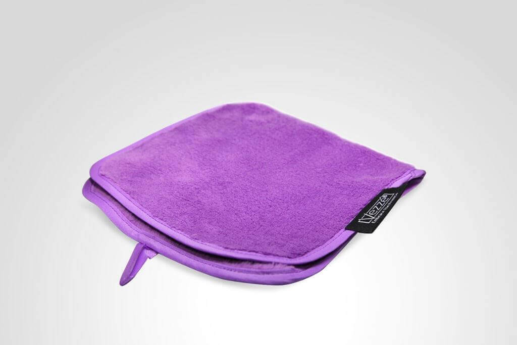 Purple microfiber cleaning cloth with brand tag on light background, ideal for dusting and polishing surfaces.